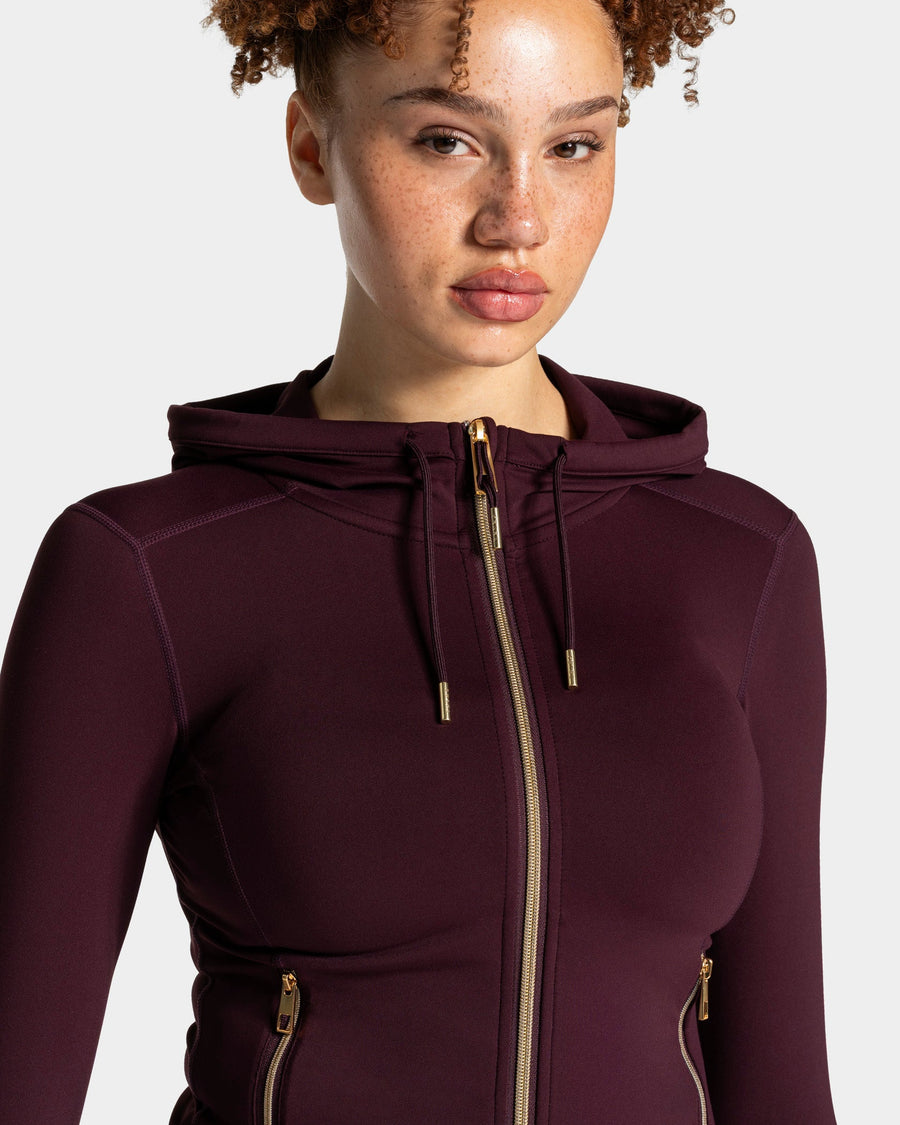 Veste de sport zippée sculptante à capuche Allrounder « merlot/dorée »