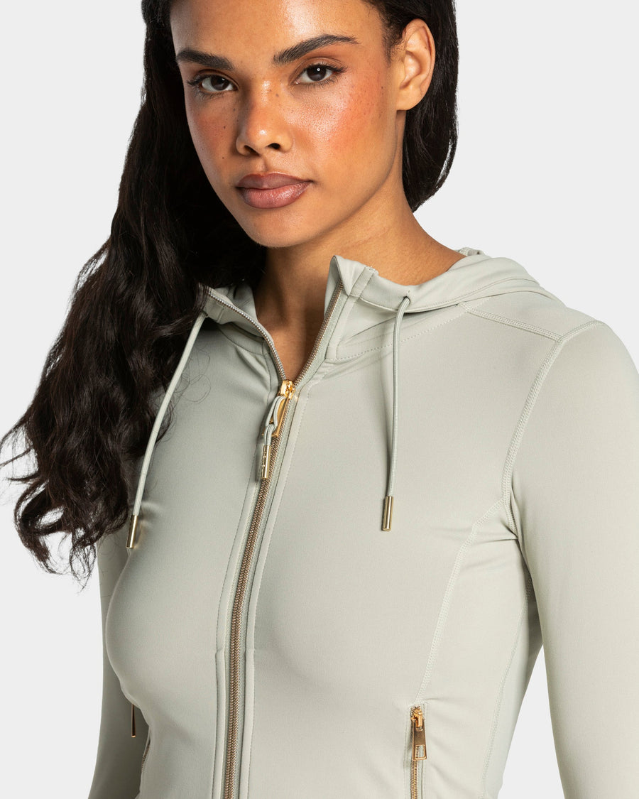 Veste de sport zippée sculptante à capuche Allrounder « pistache/dorée »
