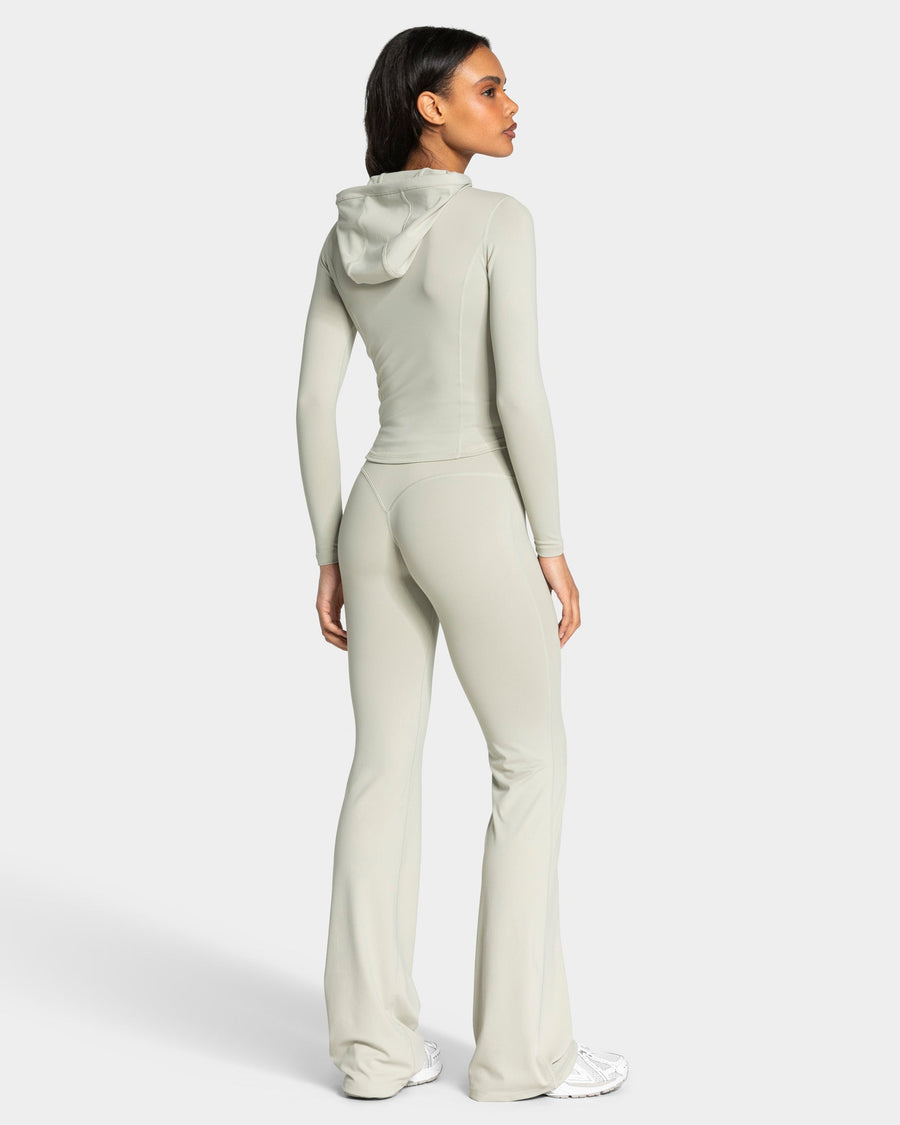 Veste de sport zippée sculptante à capuche Allrounder « pistache/dorée »