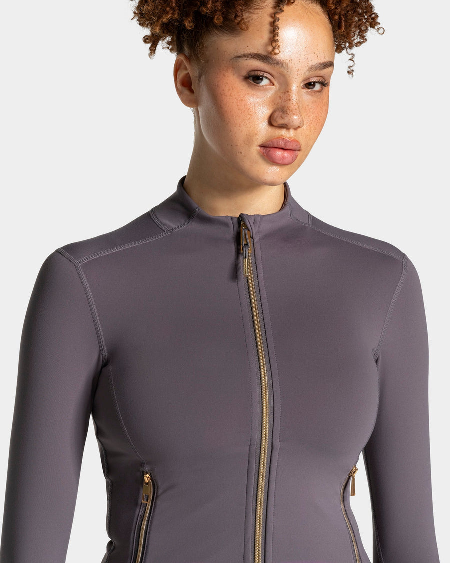 Veste de sport zippée sculptante Allrounder « graphite/dorée »
