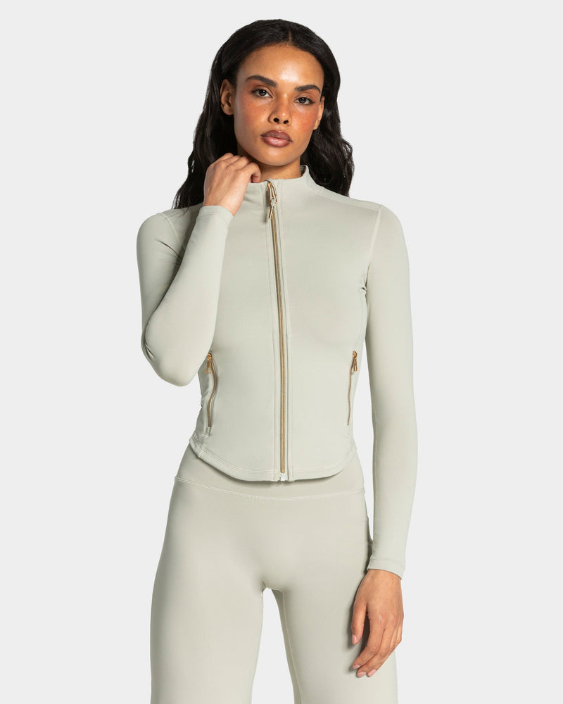 Veste de sport zippée sculptante Allrounder « pistache/dorée »