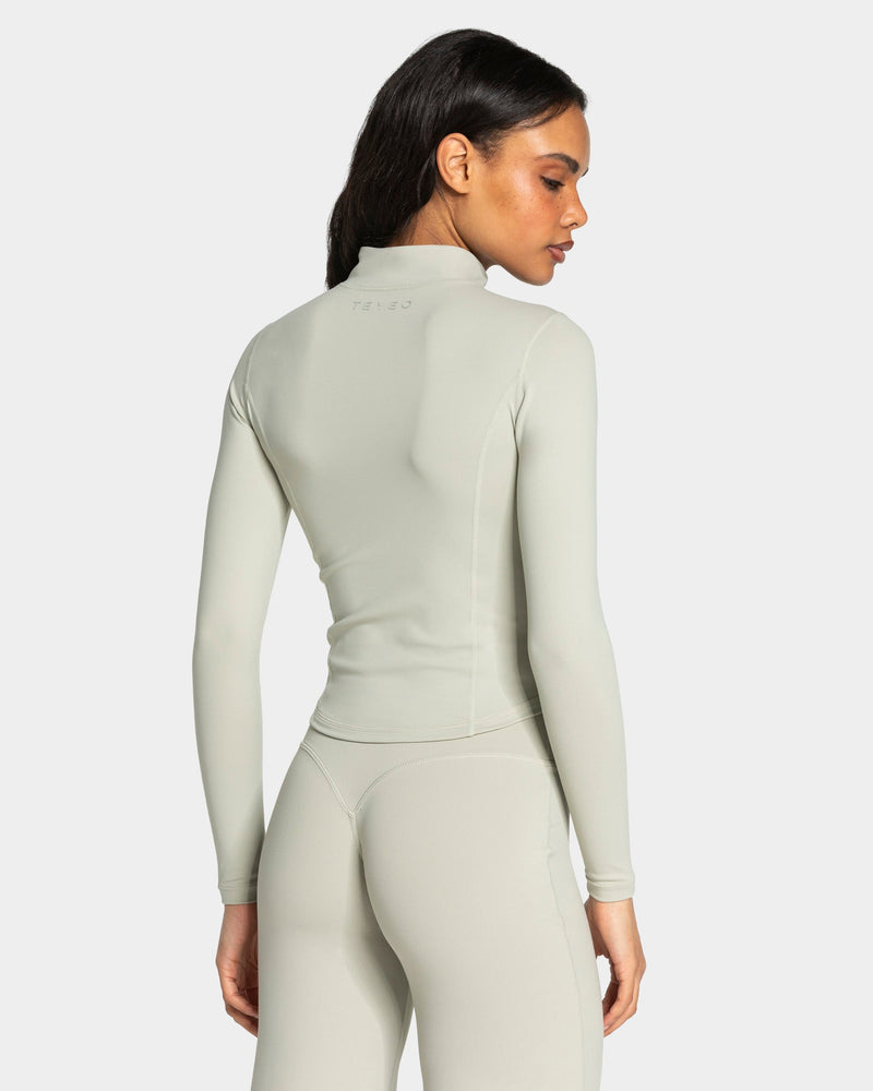 Veste de sport zippée sculptante Allrounder « pistache/dorée »