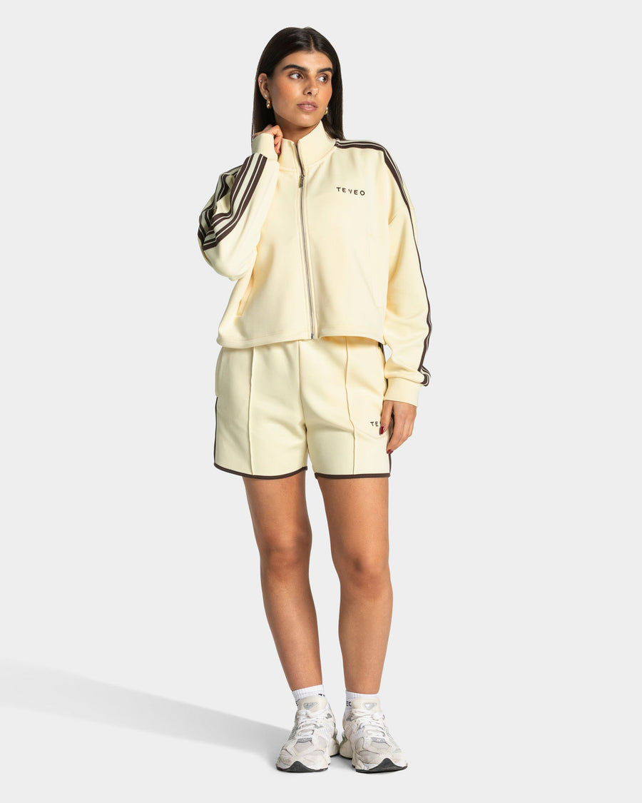 Veste de sport zippée et courte Club « Butter Yellow »