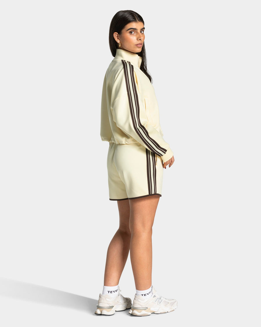 Veste de sport zippée et courte Club « Butter Yellow »