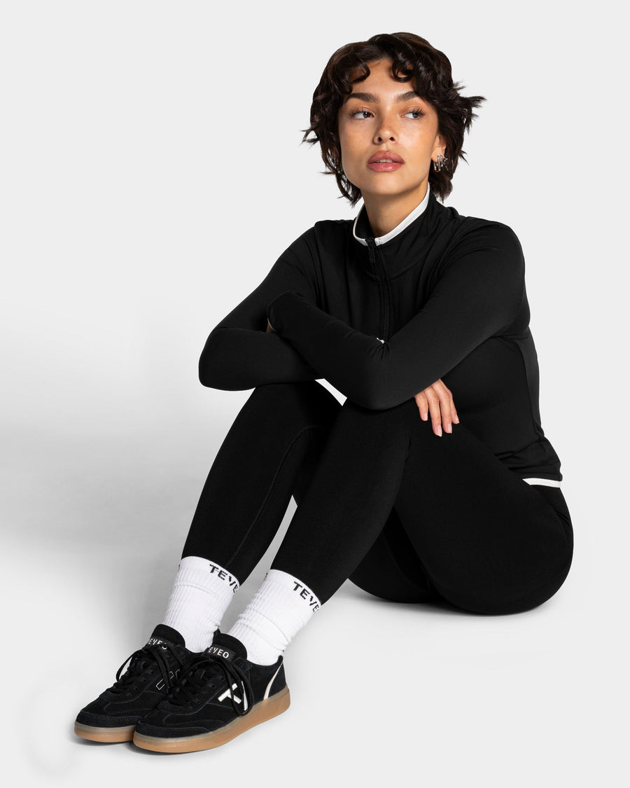 Baskets Classic Femme « noir/blanc cassé »